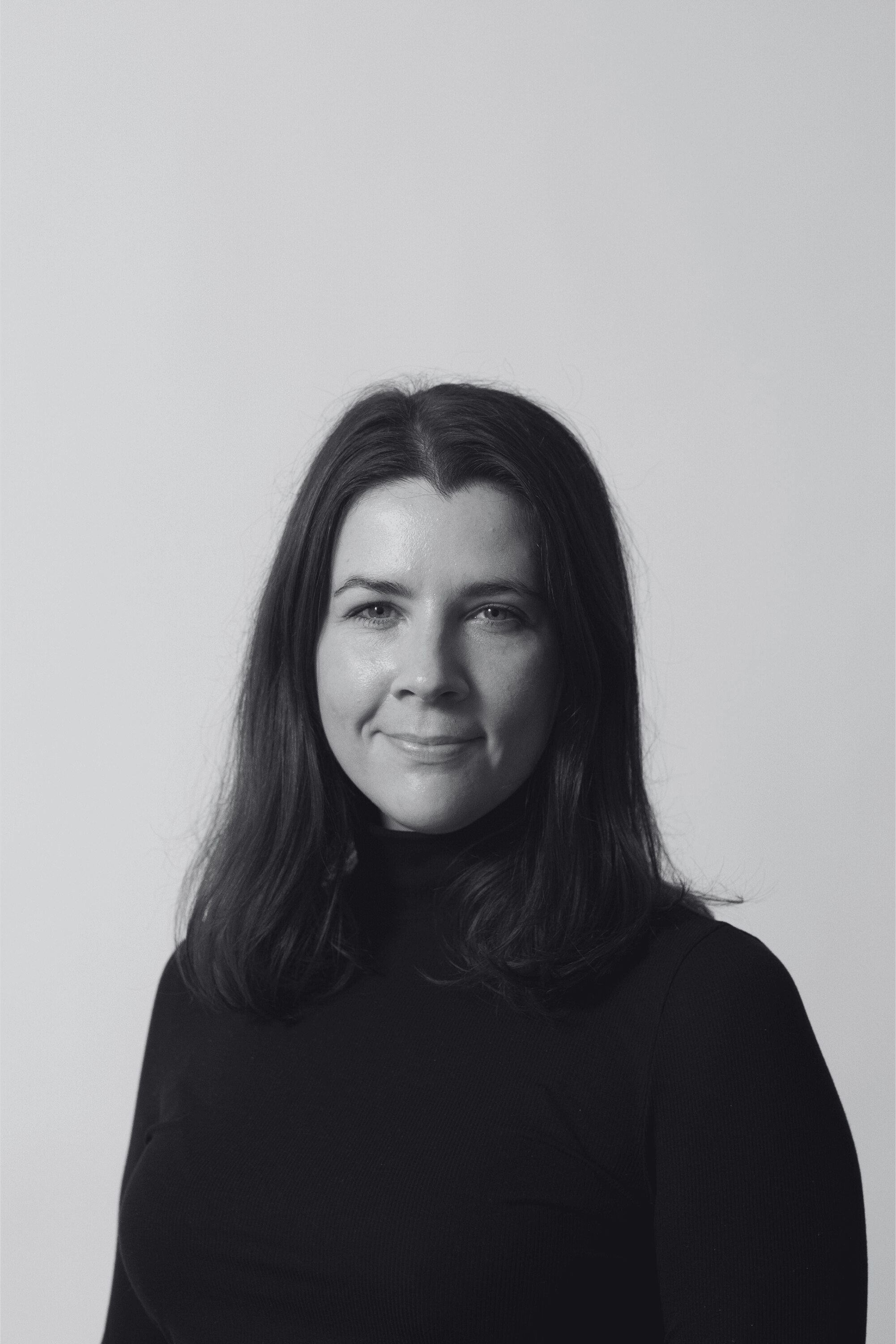 One-quarter headshot of Colette Collins-Walsh, 5Rights' Head of UK Affairs. The image has a black & white filter.