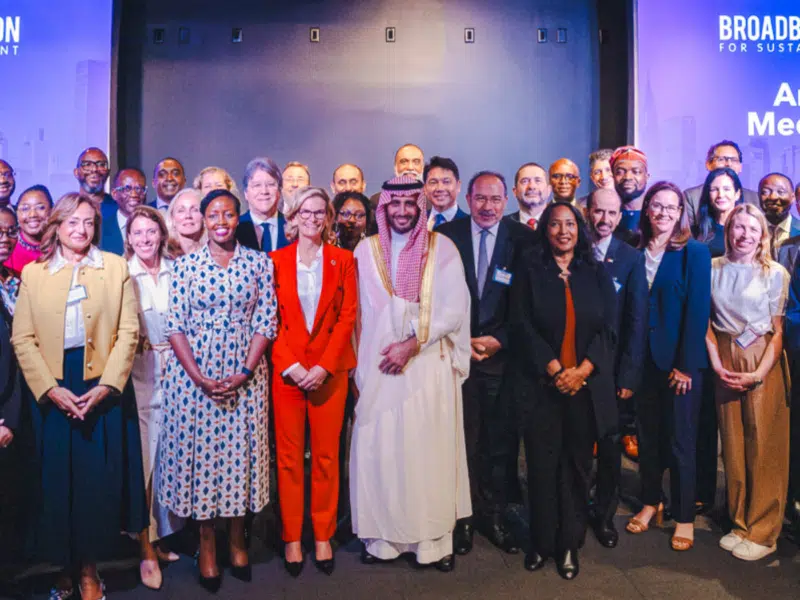 An image of the ITU/UNESCO Broadband Commission for Sustainable Development Fall Meeting 2024, Convene, New York, NY, USA, 20 September 2024. A room full of smiling faces. All are dressed formally and visibly from all around the world.