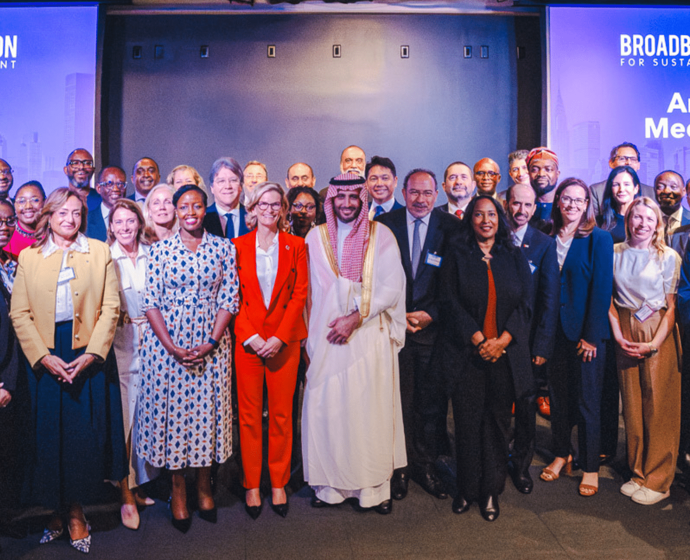 An image of the ITU/UNESCO Broadband Commission for Sustainable Development Fall Meeting 2024, Convene, New York, NY, USA, 20 September 2024. A room full of smiling faces. All are dressed formally and visibly from all around the world.